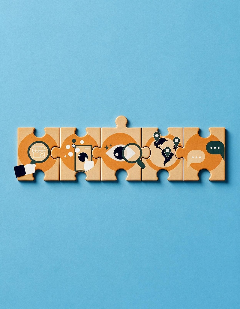 Five interlocking puzzle pieces on a blue background, each carrying an icon for one visibility area: a shopfront under a magnifier, a website on a phone, an eye with a magnifier, a map with location pins, and review speech bubbles
